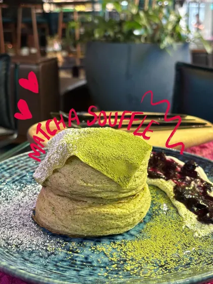 A beautiful matcha souffle, with a doodle to label it and some hearts to show my love for it.