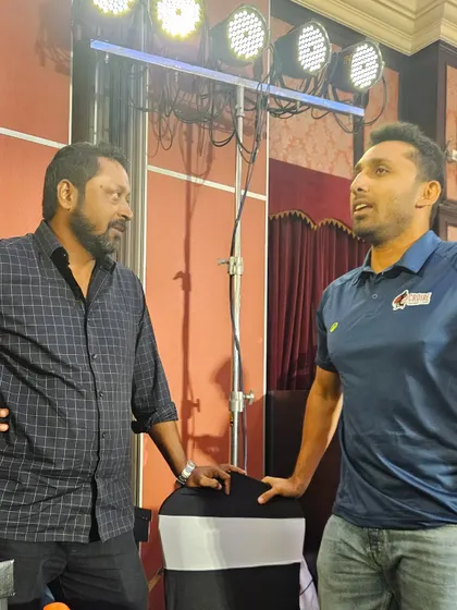 In conversation with a fellow coach at the event. Discussing the finer points of the game and coaching methodologies is always insightful.
