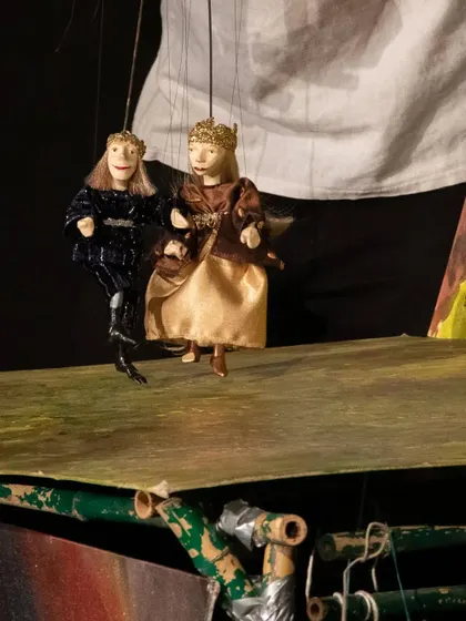A royal couple, depicted as marionettes, from the Hungarian folktale performance 'Dragon and the Devil'. The show is a spellbinding journey into a world of magic, heroes, and mythical creatures.