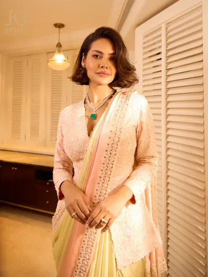 Esha Gupta embodies modern royalty in our emerald pendant necklace, a piece designed for women who are confident and stylish.
