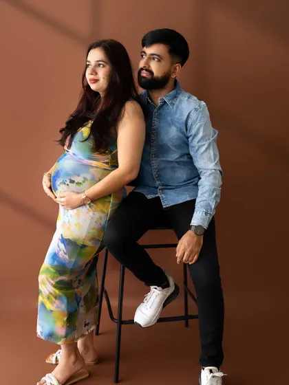A stylish couple's portrait where they are looking off-camera together, creating a sense of shared dreams and anticipation.
