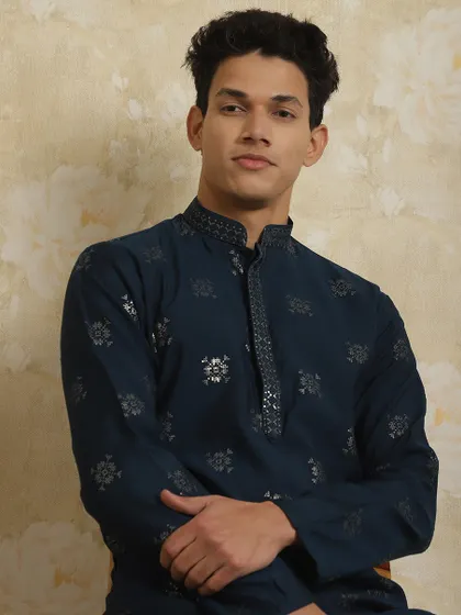 A closer look at the silver embroidery on my navy blue kurta, showcasing the fine detailing around the collar.