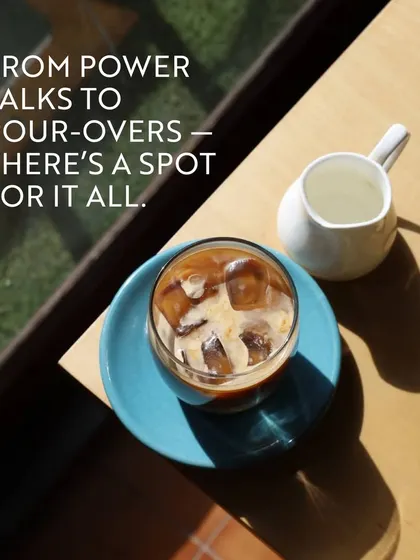 An iced pour-over coffee in the sunlight. The caption 'From power talks to pour-overs, there's a spot for it all' highlights the versatility of my cafe spaces for any type of meeting.