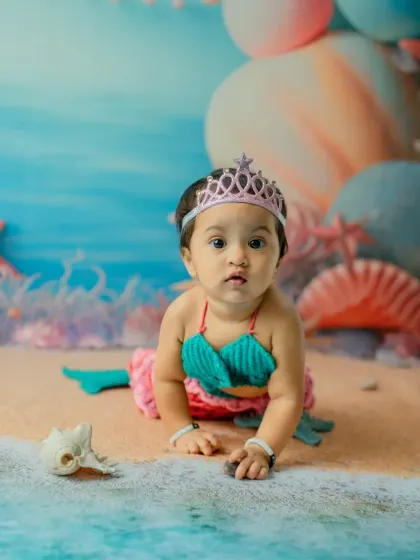 A different angle of the baby crawling, highlighting her determination and the beautiful textures of the set.