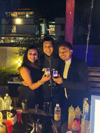 Sharing a smile with the happy couple, Mit and Nikita. We love personalizing the experience, right down to the custom photo tags on their cocktails.