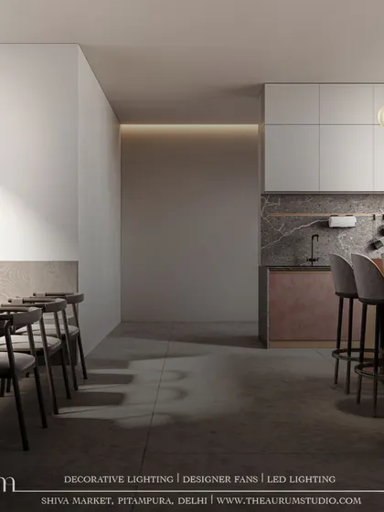 A modern pendant with two offset glass globes adds a sculptural, artistic touch. This design redefines elegance in every detail, providing both light and a conversation piece.