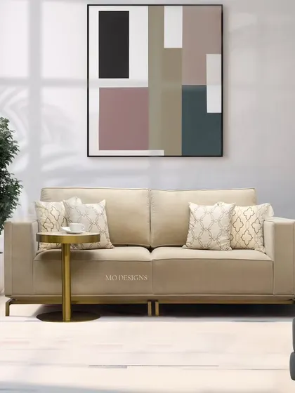 This rich beige sofa is a study in minimalist beauty and maximum comfort. Crafted with meticulous attention to detail, its timeless elegance and modern sophistication make it a perfect centerpiece for a calm and inviting living room.