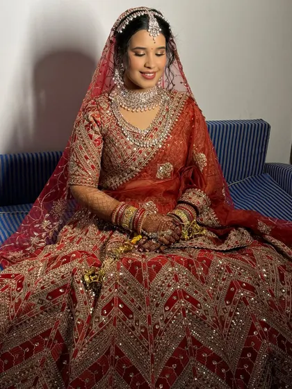 The bride's radiant glow is the centerpiece of this look. I use techniques to ensure the skin looks luminous and healthy, not heavy.