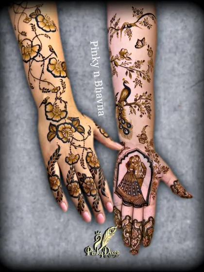 Here you can see how a couple portrait on the palm connects with floral and peacock designs on the arm, creating a cohesive and beautiful bridal look.