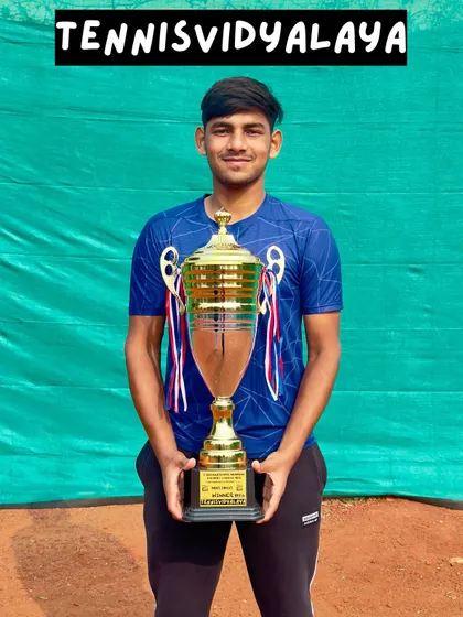 Our champion Mayank Sharma with his winner's trophy from the Rajesh Patel Memorial AITA Men's Tournament.