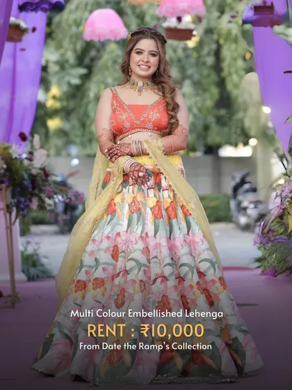 A multi-color embellished lehenga with a floral print. This outfit is pure joy and perfect for a fun-filled Haldi or Mehendi.
