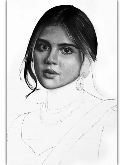 A progress shot of the Kalyani Priyadarshan portrait. Her face and hair are almost complete, while her necklace and saree are still in the outline phase.