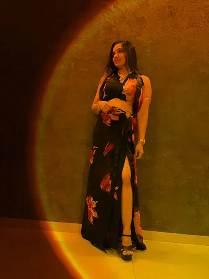 A dramatic shot of the sarong drape, highlighting the modern and fashionable appeal of this style.
