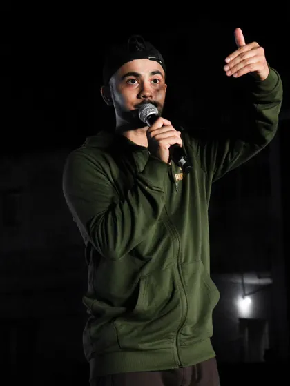 Another photo of me hosting the event, ensuring the crowd stays engaged between sessions. A great host is key to a successful fitness event.