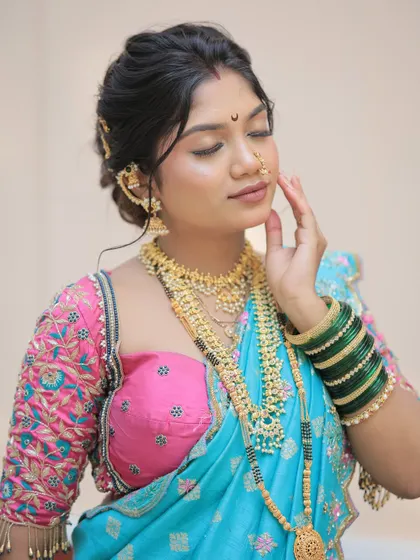 A serene moment from the Gudi Padwa shoot. The makeup is soft and natural, letting the client's traditional attire and jewelry shine.