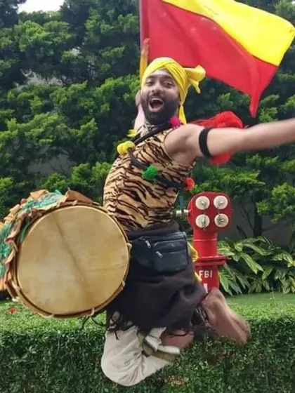 A Dollu Kunitha artist in a moment of pure, unbridled joy. This image, while capturing a fellow artist, also represents the powerful, energetic spirit of the folk forms I work with.