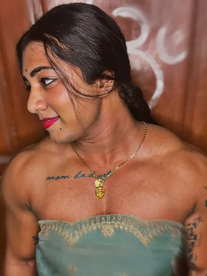 A profile view from the 'Beauty with the Beast' series. It gives a clear look at my shoulder and clavicle definition, a result of dedicated training.