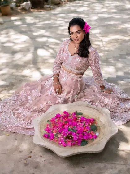 Another beautiful shot from the model shoot with the pink lehenga and bougainvillea flowers.