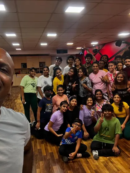 A selfie with the class after a successful summer workshop performance. The joy and sense of accomplishment are clear on everyone's faces.