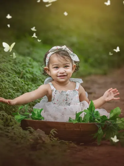 Surrounded by a swirl of butterflies, this happy toddler's smile is absolutely infectious. My fine art edits are designed to enhance the magic of childhood.
