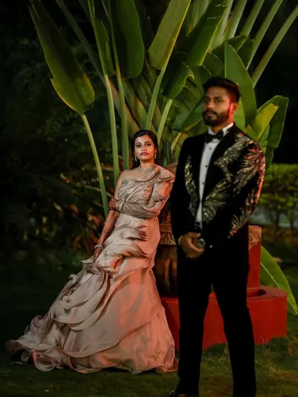 A power couple slaying their reception look. We love capturing the confidence and style of our couples, creating portraits that are both fashionable and full of personality.