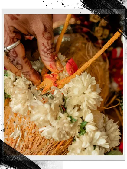 A close-up of a traditional ritual object from a South Indian wedding.