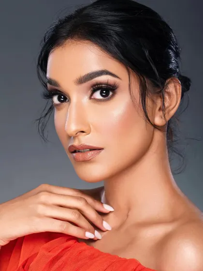 A clean and classic portrait for a lash campaign. The model's pose is simple and elegant, and the lighting is bright and even, ensuring the lashes are the hero of the shot.