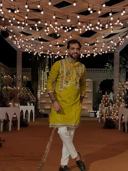 A stylish pose in my ethnic wear. My fashion sense is a mix of traditional and modern, much like my hosting style.