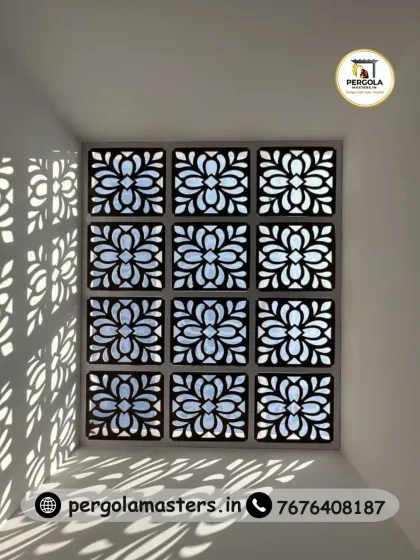 This is how we transform a simple ceiling into a captivating feature. We crafted this skylight using custom-cut panels in an ornate floral pattern, creating a dynamic play of light and shadow that shifts throughout the day and adds a layer of artistic elegance to the room below.