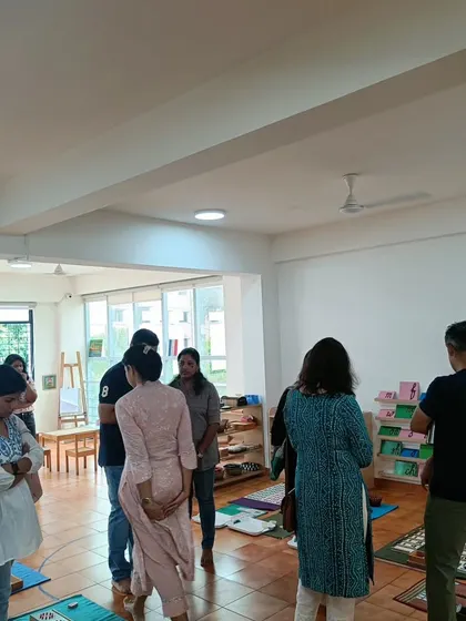 Another group of parents exploring the materials and learning about the curriculum.
