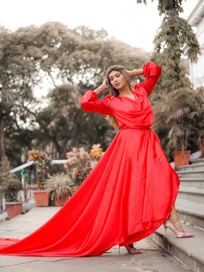 Capturing the drama of the gown with a dynamic pose.
