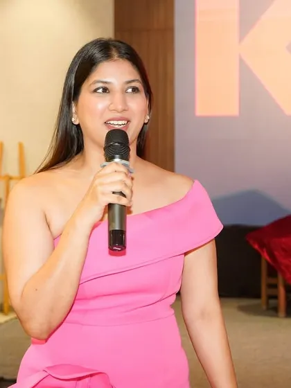 A candid shot from the Kress Dealers Meet, where I am interacting with the audience to create a lively and conversational atmosphere.