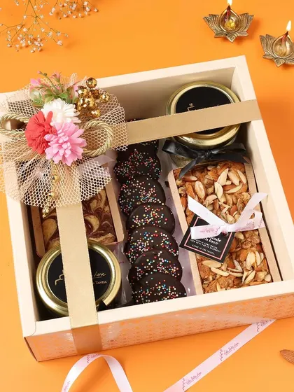 A premium wooden gift box for Diwali, packed with cookies, brownies, and jars of my special treats.