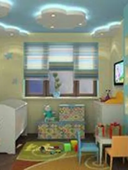 This nursery or toddler's room uses a soft blue and yellow color palette with cartoon wall decals. The cloud-themed false ceiling with backlighting adds a magical touch.