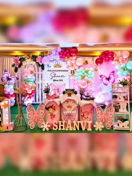A slightly blurred but dynamic shot of Shanvi's butterfly party.