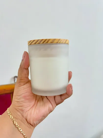 This frosted jar with a wooden lid is a very popular choice. It's perfect for creating your own branded candles without the hassle of making them yourself.
