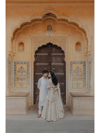 We blend romance with heritage in our pre-wedding shoots. This portrait, set against the royal architecture of Jaipur, captures a quiet, intimate moment that feels both timeless and deeply rooted in culture, showcasing our love for destination photography.