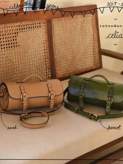 Introducing the Celia, our vintage-inspired cylindrical sling, shown here in solid Sand and hand-colored Parrot leather.