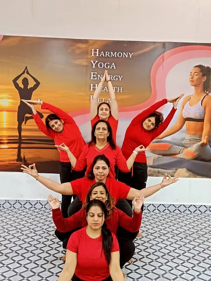 Our students creating a beautiful human pyramid during a group Acro Yoga session. This showcases the spirit of collaboration and shared achievement in our classes.
