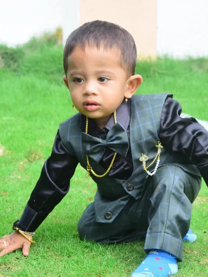 This handsome little cupcake in a custom 3-piece suit with a bow tie. Perfect for a formal event or a birthday party.