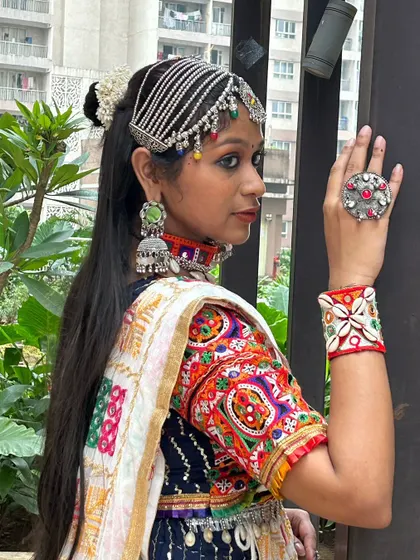 Another angle focusing on the statement ring and embroidered cuff, essential pieces for any Garba dancer.