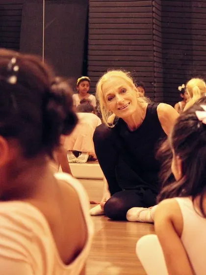 A smile from our Artistic Director, Ms. Yana, as she sits with the pre-primary class. We prioritize a warm, personal connection with every student.