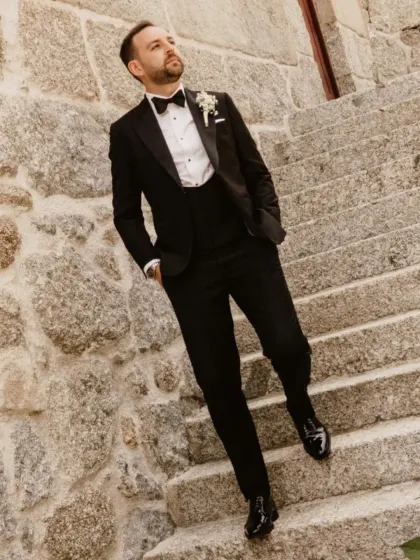 I believe a groom's attire should be as memorable as the occasion itself. This custom-tailored classic black tuxedo, created for an international client, features a flawless fit and timeless elegance, ensuring you look and feel your best on your wedding day.