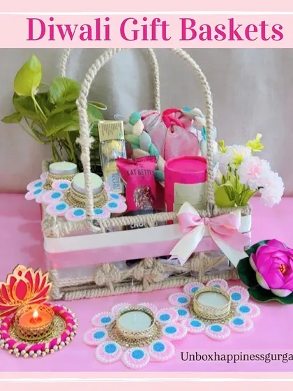 A complete arrangement of the pink-themed Diwali basket with its accompanying decorative items, creating a beautiful gift set.