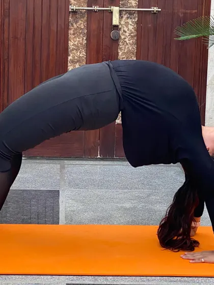 This is Chakrasana, or Wheel Pose. It is a deep backbend that opens up the entire front of the body and builds strength in the arms, shoulders, and legs.