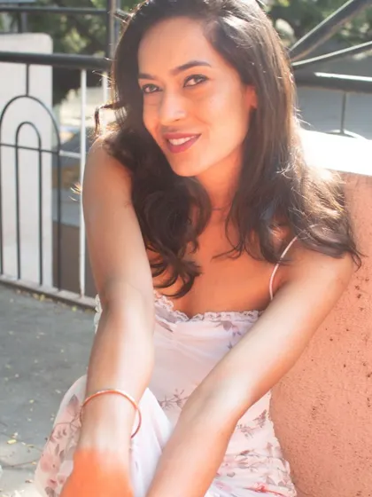A warm, smiling portrait. I believe my approachability is one of my biggest strengths as a host.