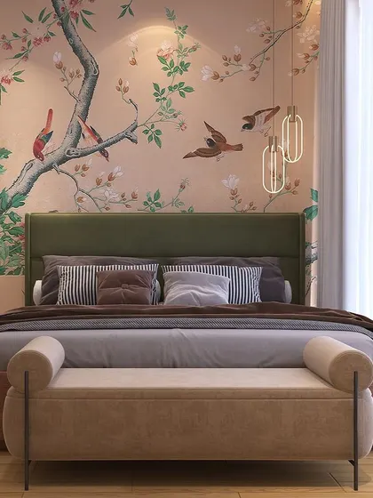 A minimalist bedroom design featuring a beautiful, custom-printed chinoiserie wallpaper. The deep green upholstered headboard provides a rich contrast, creating a space that is both simple and artistic.