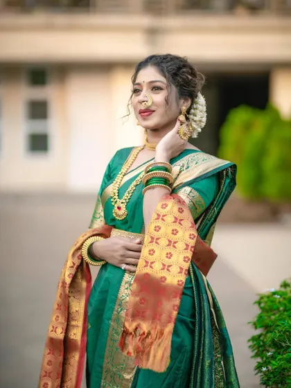 A beautiful three-quarter shot of the model in her complete traditional attire.
