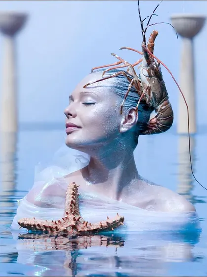 A surreal beauty concept for a JW Marriott food festival promotion. The image combines elements of water, seafood, and high fashion to create a memorable and unconventional visual.