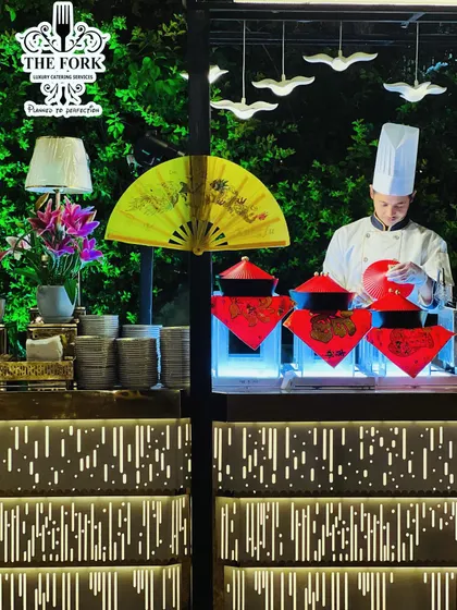 I bring the theater of cooking to your event with interactive live stations. Here, one of my chefs prepares authentic Pan-Asian cuisine, offering guests a fresh, engaging, and personalized dining experience that becomes a highlight of the occasion.